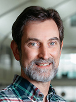 Furnstahl smiling with PRB atrium behind him