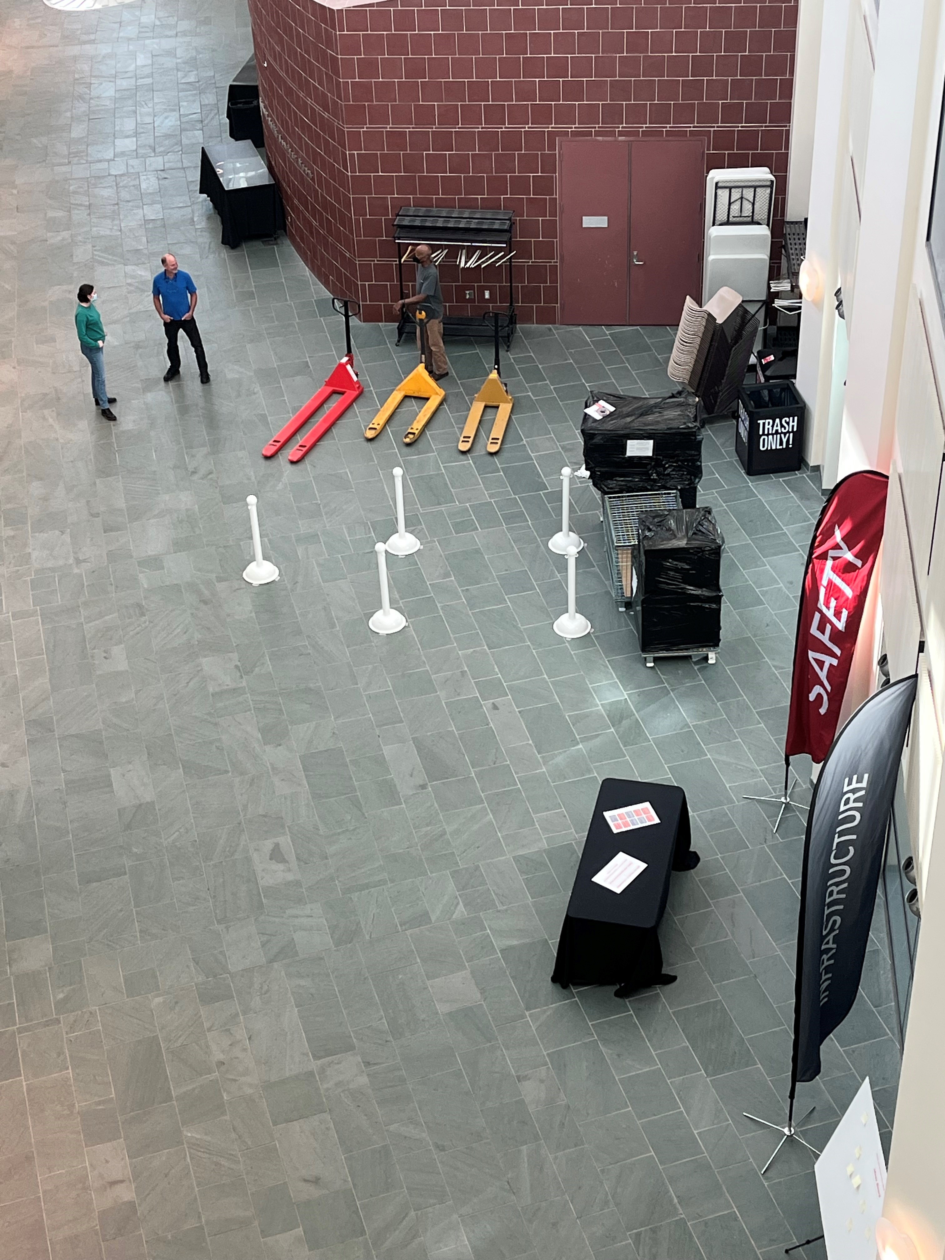 looking down at the atrium and S+I week booth