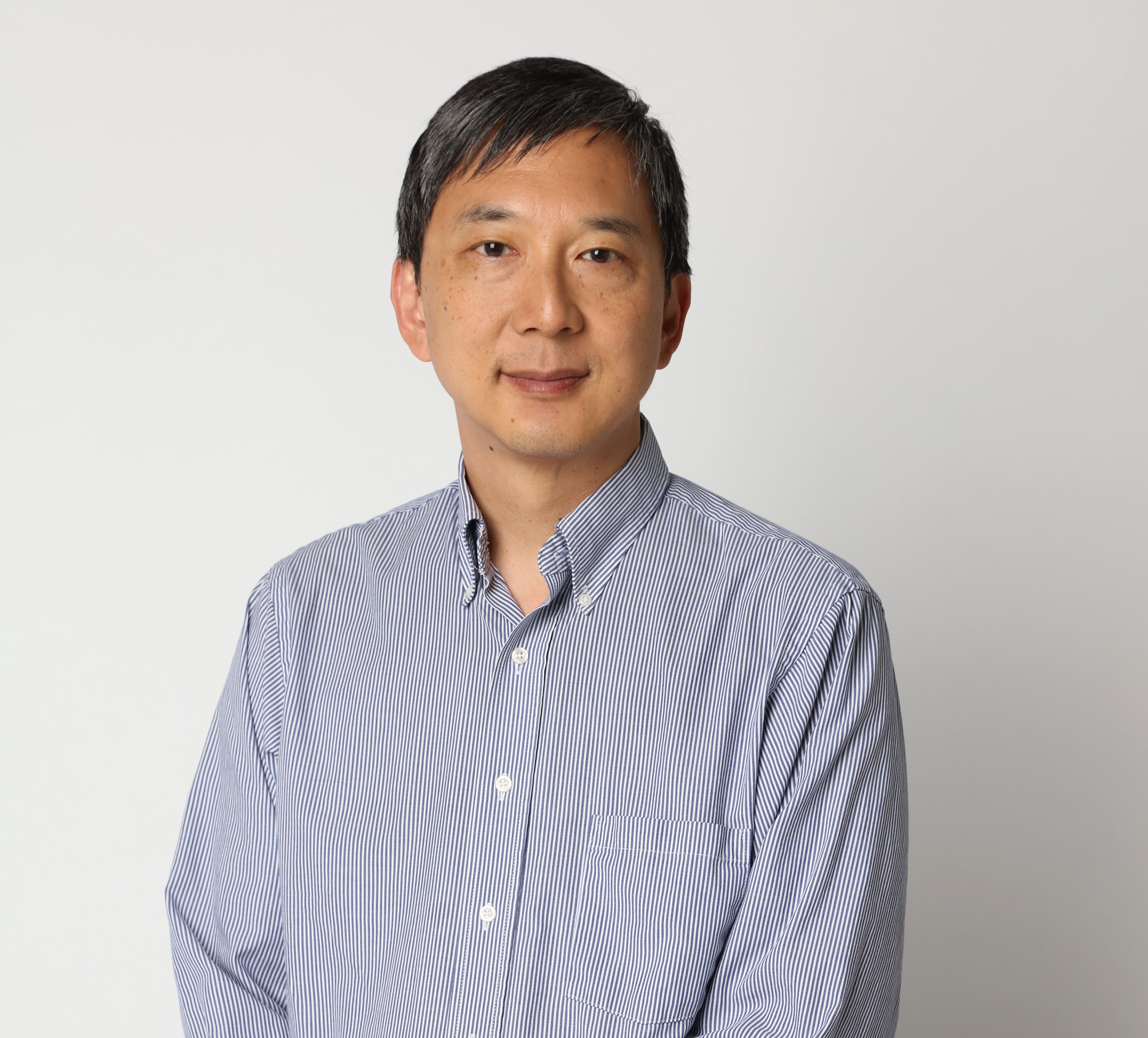 Photo of Kenneth Chang with plain white background