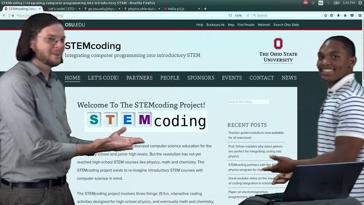 Prof. Chris Orban standing in front of image about STEM coding with a student