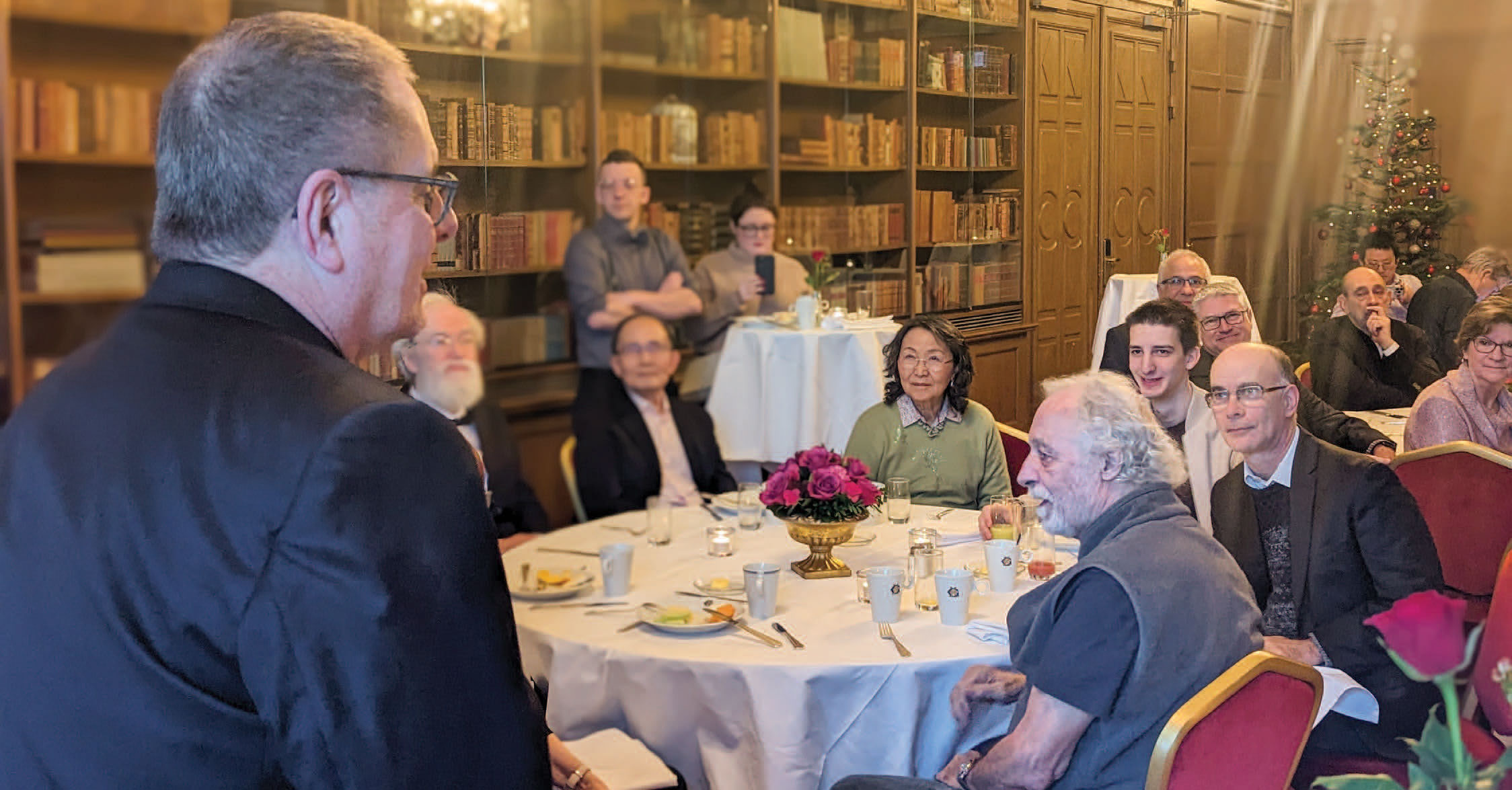 Lou DiMauro welcomes the guests of Nobel Laureate Pierre Agostini at a celebratory breakfast hosted by The Ohio State University in Stockholm, Sweden. Long-time colleagues and friends shared cherished memories of friendship and scientific work with Pierre Agostini. Photo Credit: David Foley