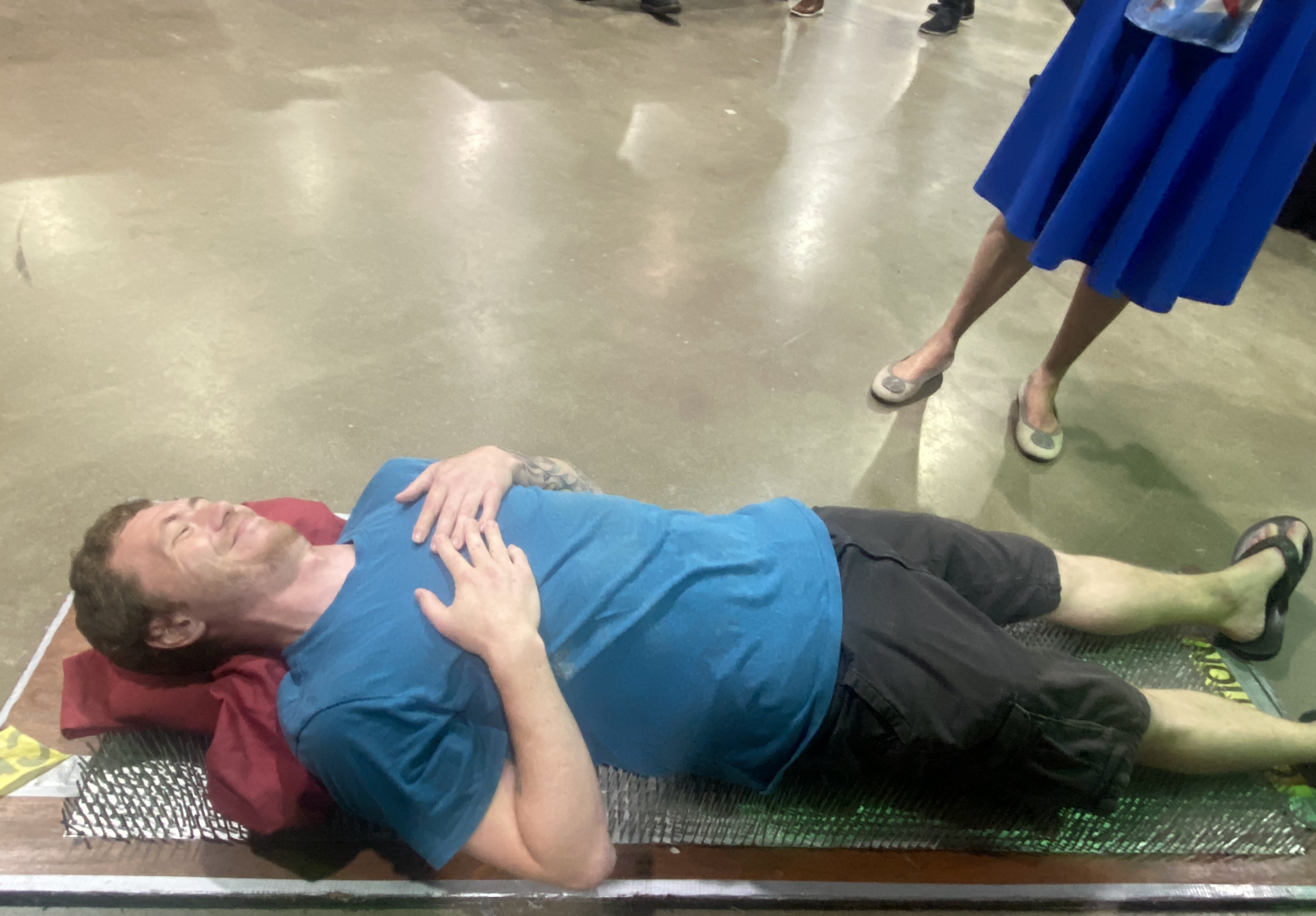 Alex on the bed of nails