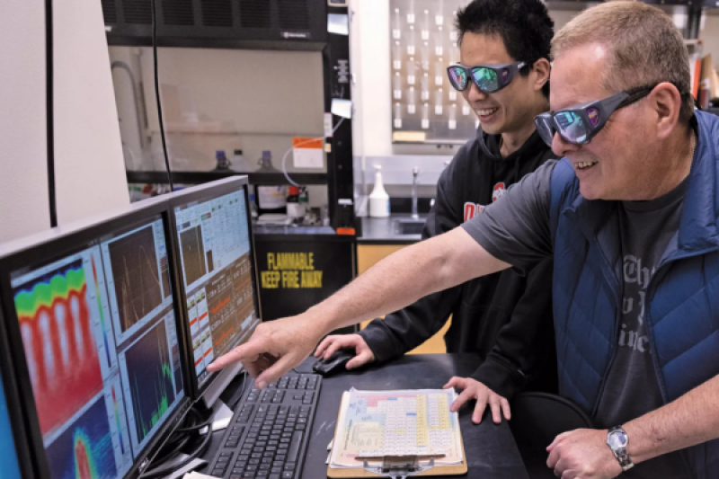 Lou DiMauro and Yaguo Tang in Lab