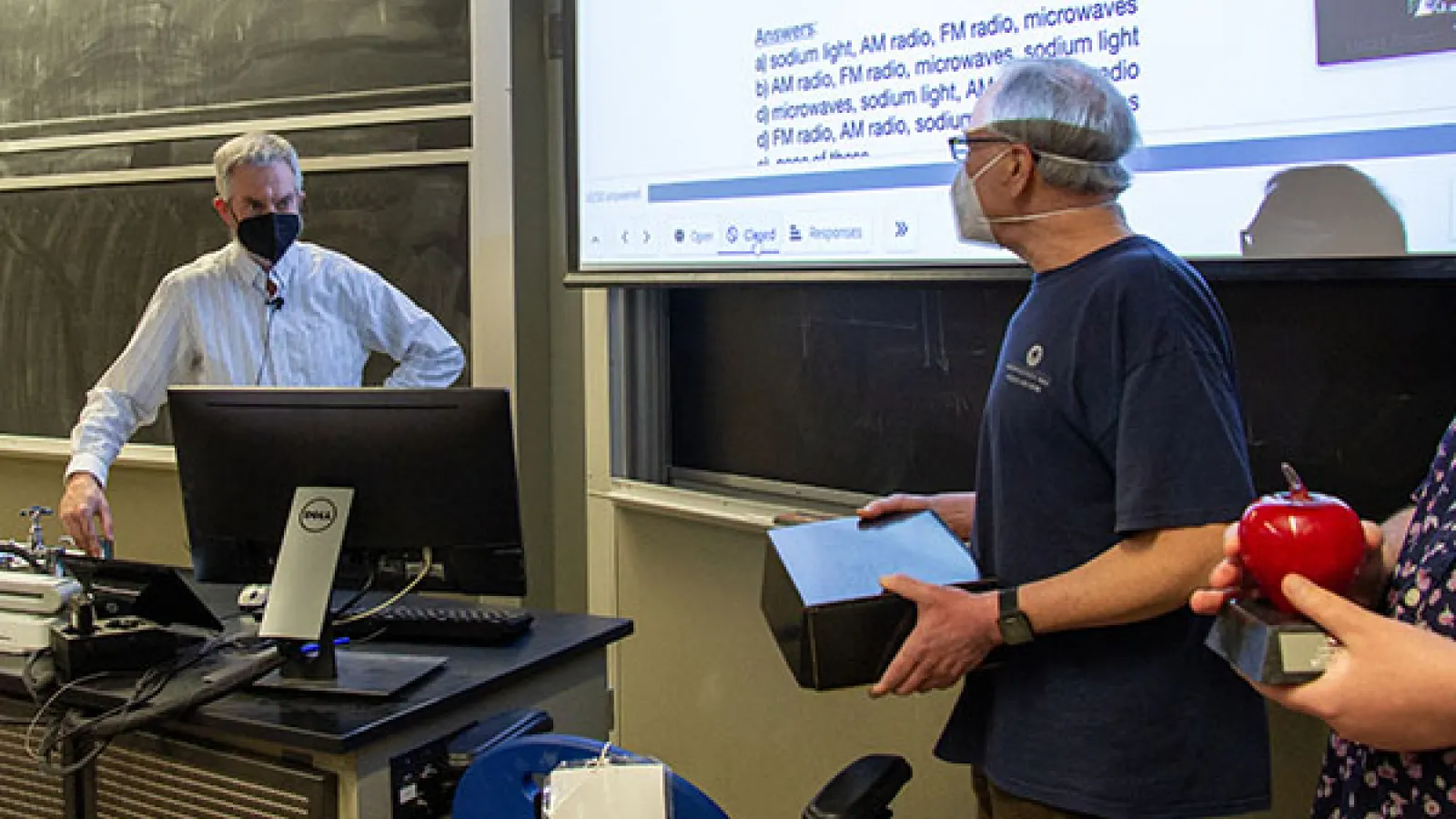 Tom Humanic surprising Brian Winer with teaching award
