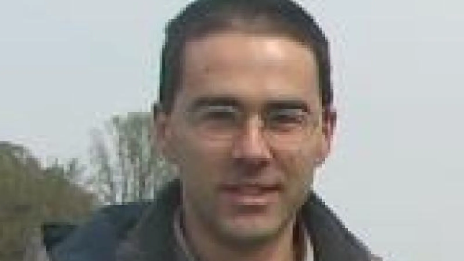 Gleb Finkelstein with trees in distance