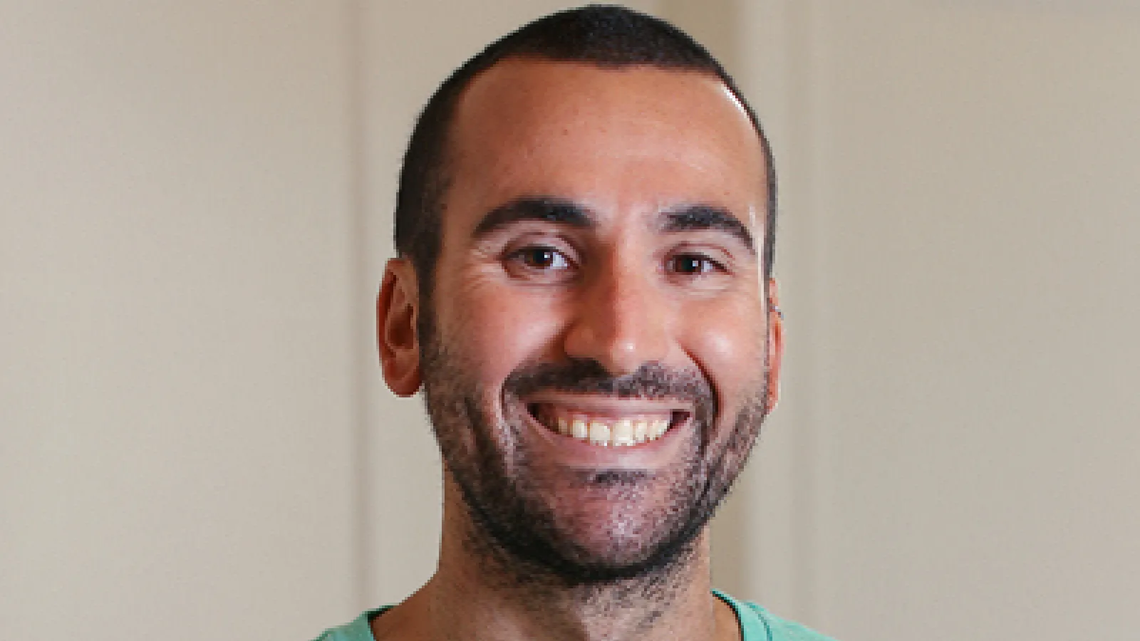Headshot of David Penneys with neutral background