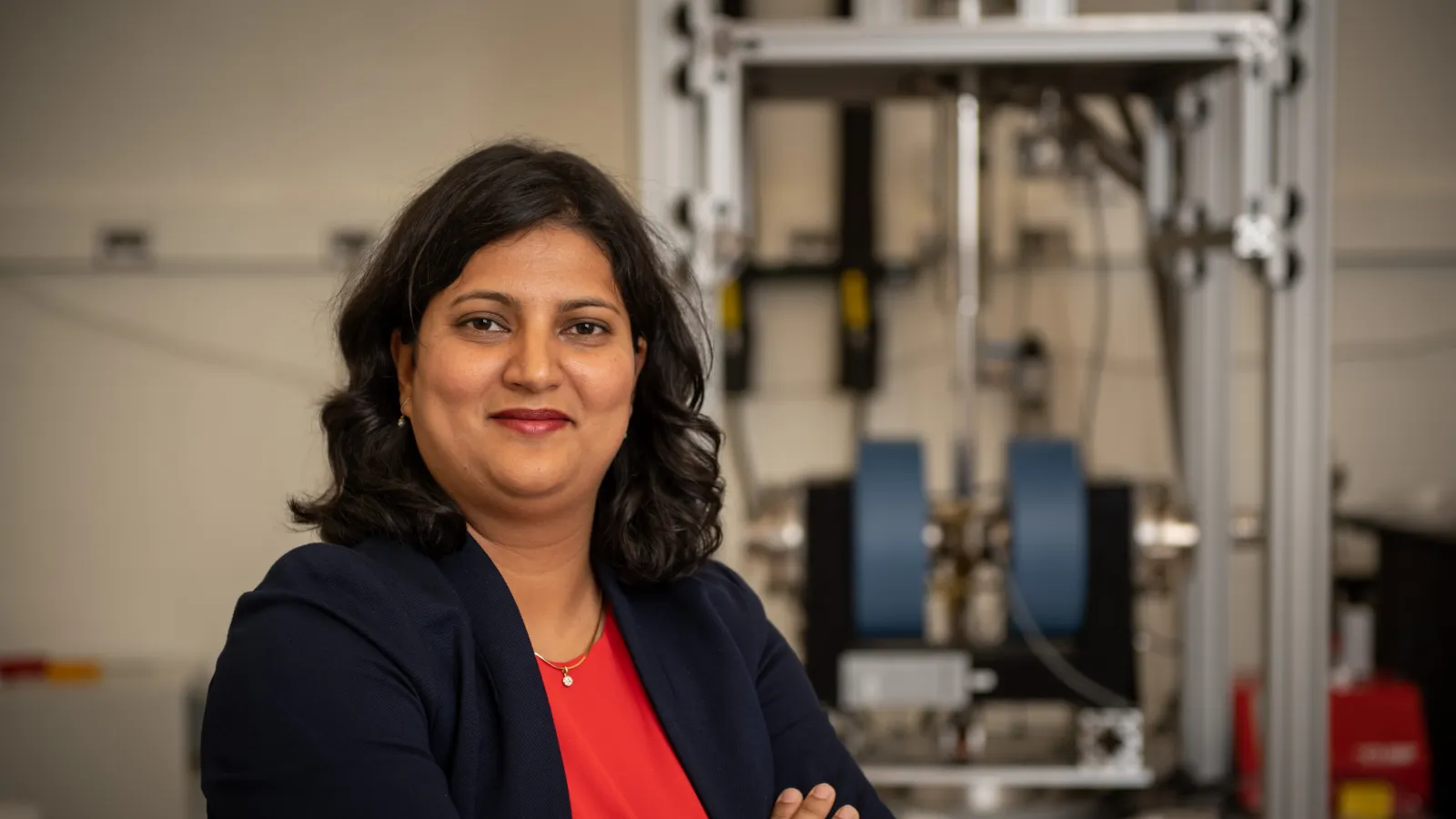 Jyoti Katoch standing in lab.