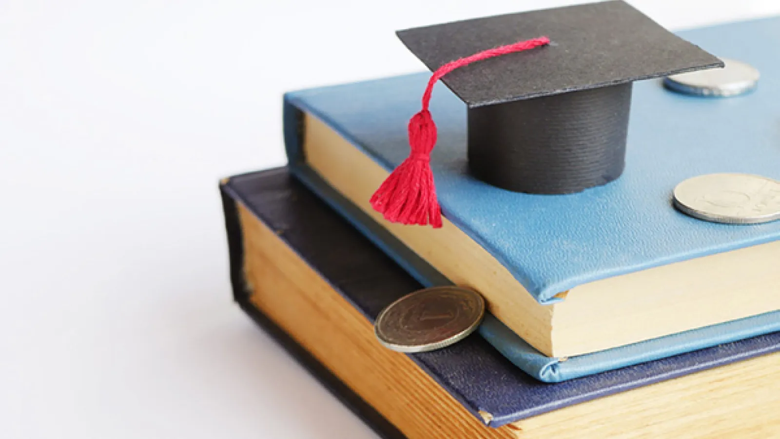 Books and graduation cap