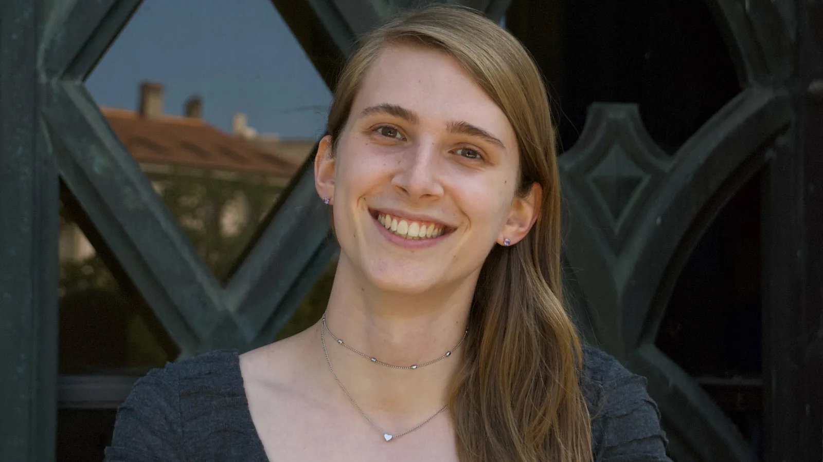 Tessa Cookmeyer smiling in front of a window