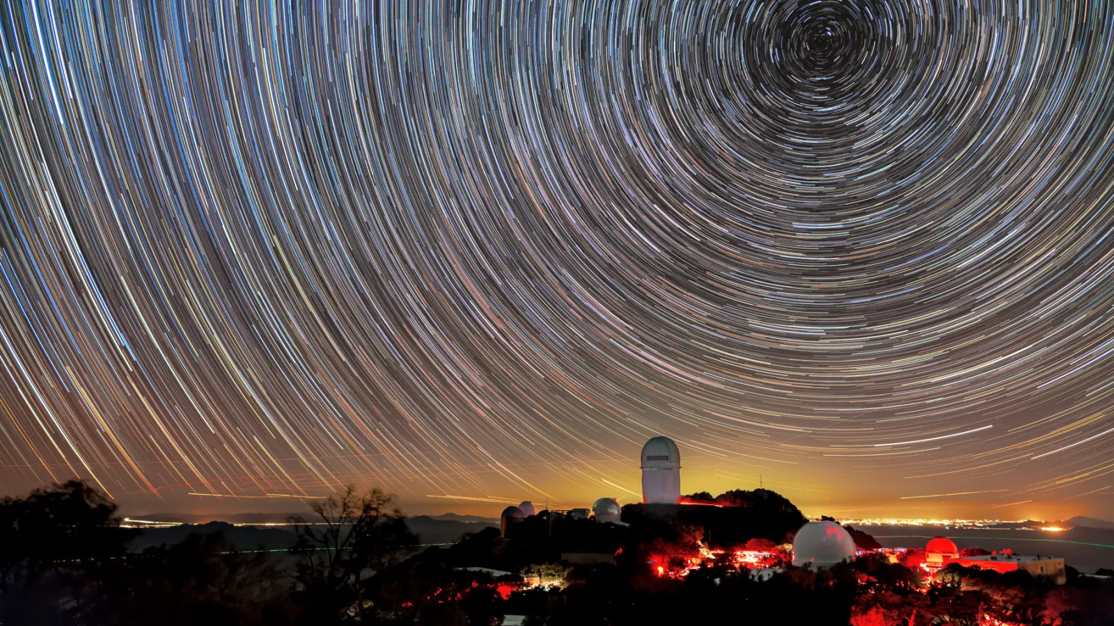  Mayall Telescope, shown here beneath star trails