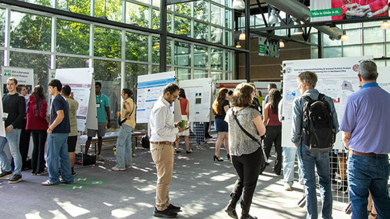 Group of People viewing projects showcased