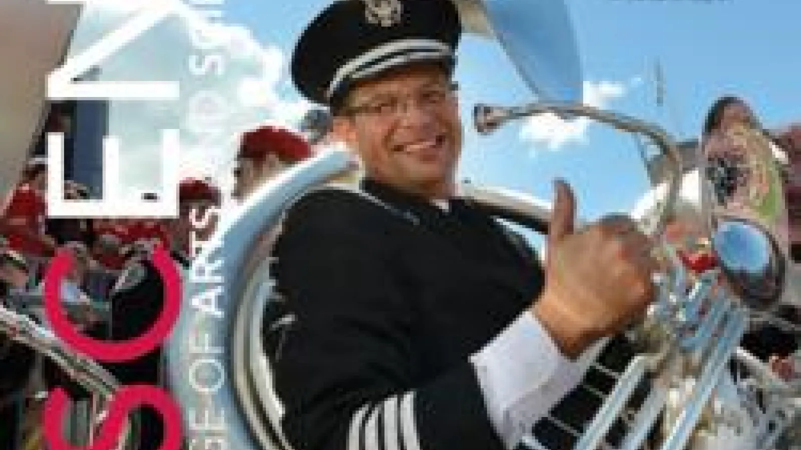 Cover of ASCent magazine with OSU marching band member smiling and giving thumbs up