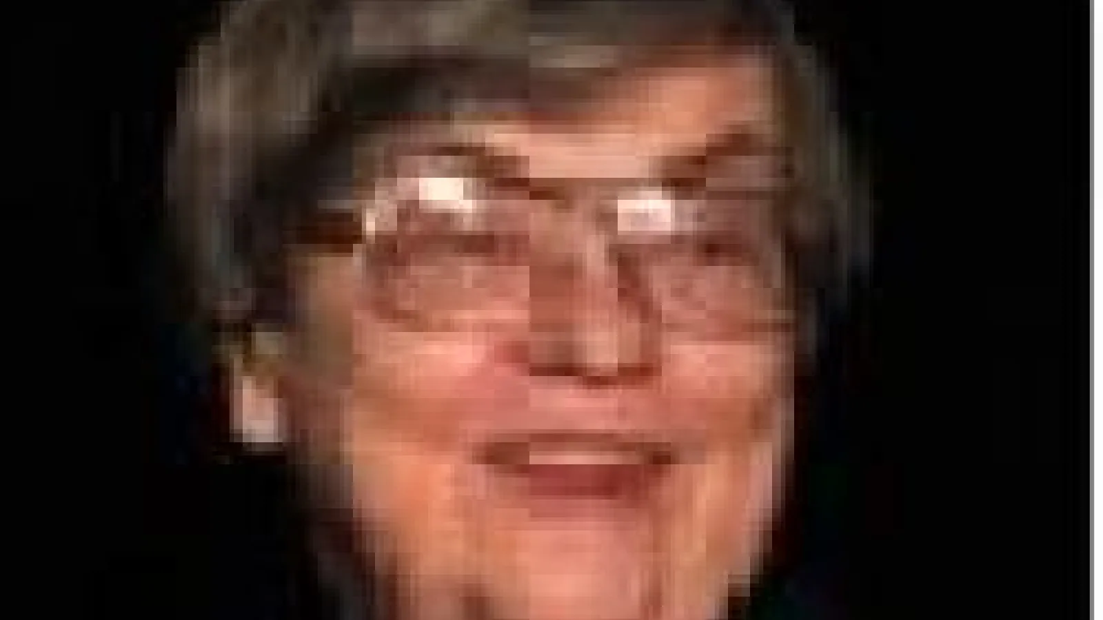 Helen Farrell blurry with black background