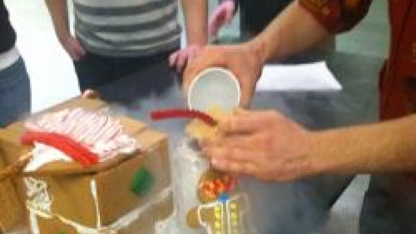 A gingerbread house demonstration from the Physics Gingerbread Competition.