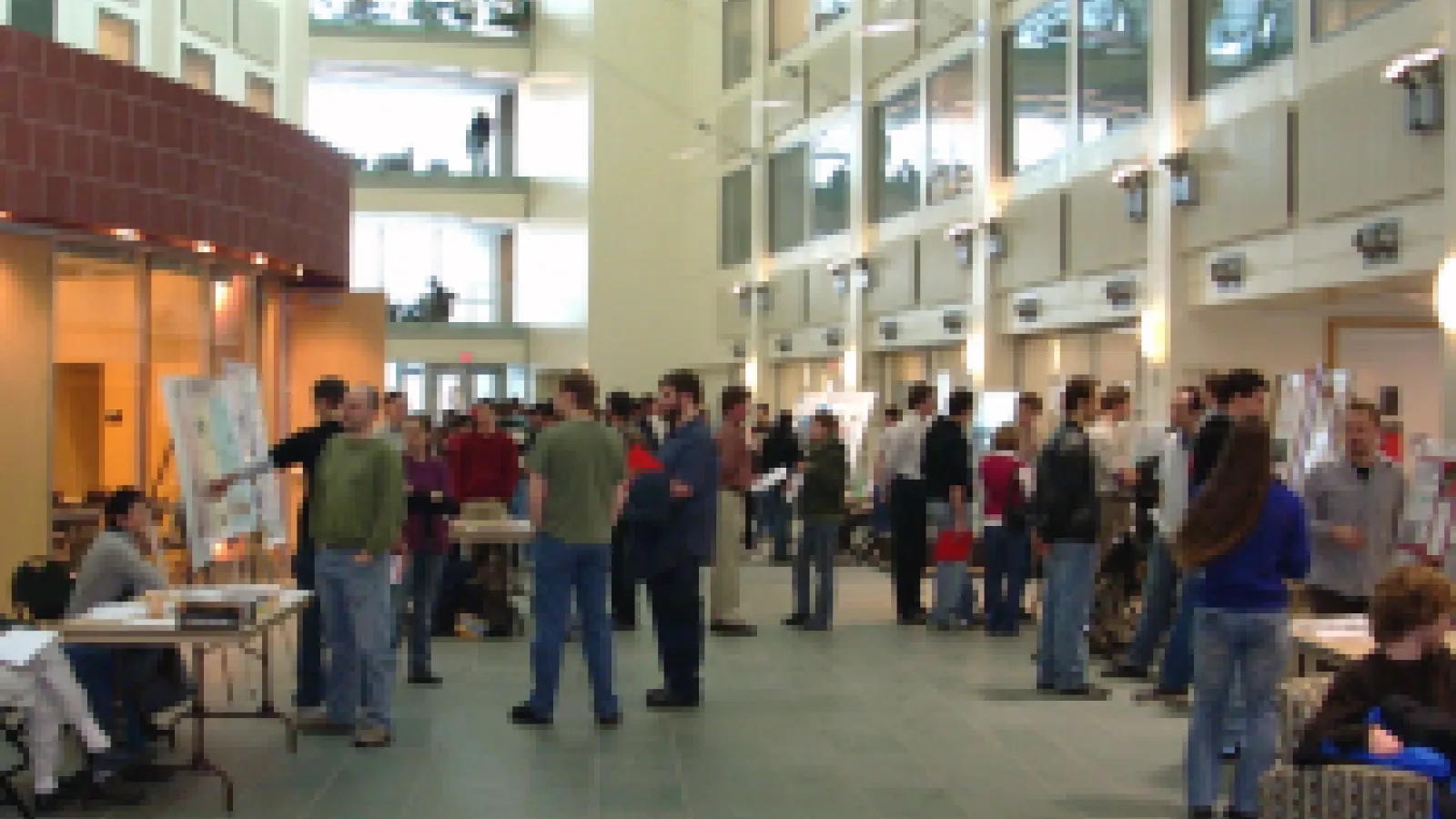 Crowd of grad students milling about the PRB Atrium