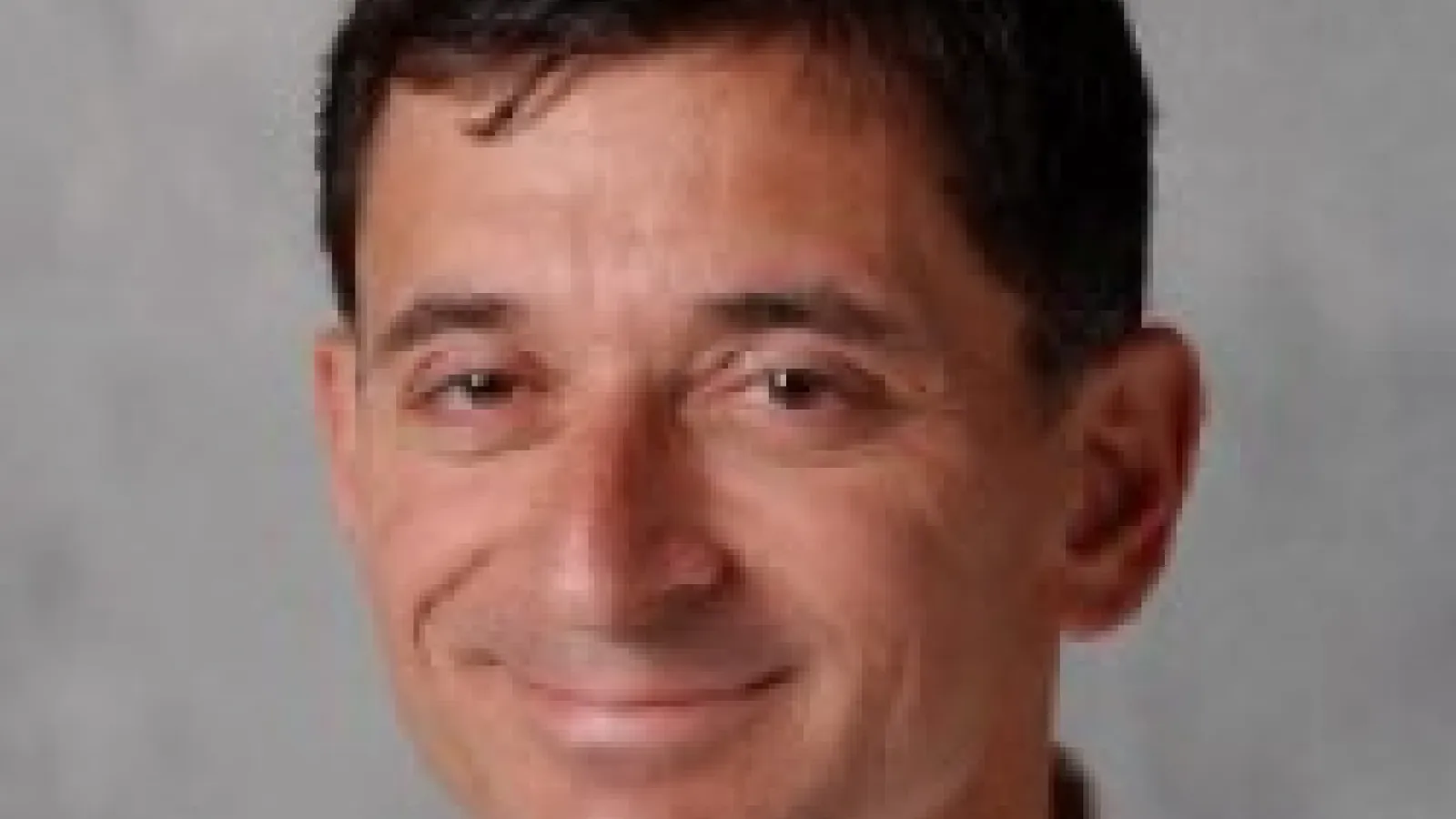 A headshot of Richard Catrambone (Georgia Institute of Technology) with a grey background.