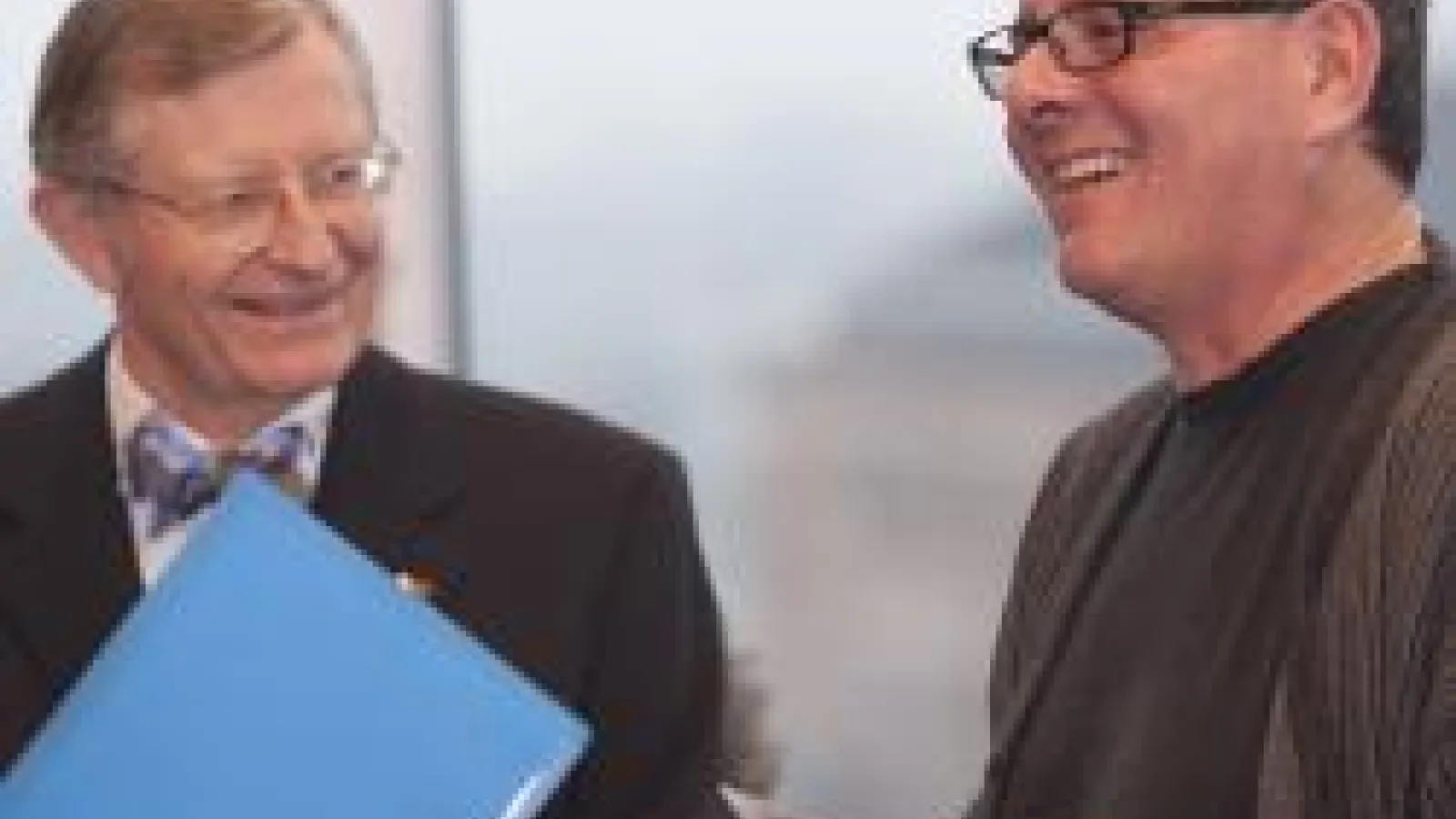 President Gee and Lou DiMauro smiling and laughing