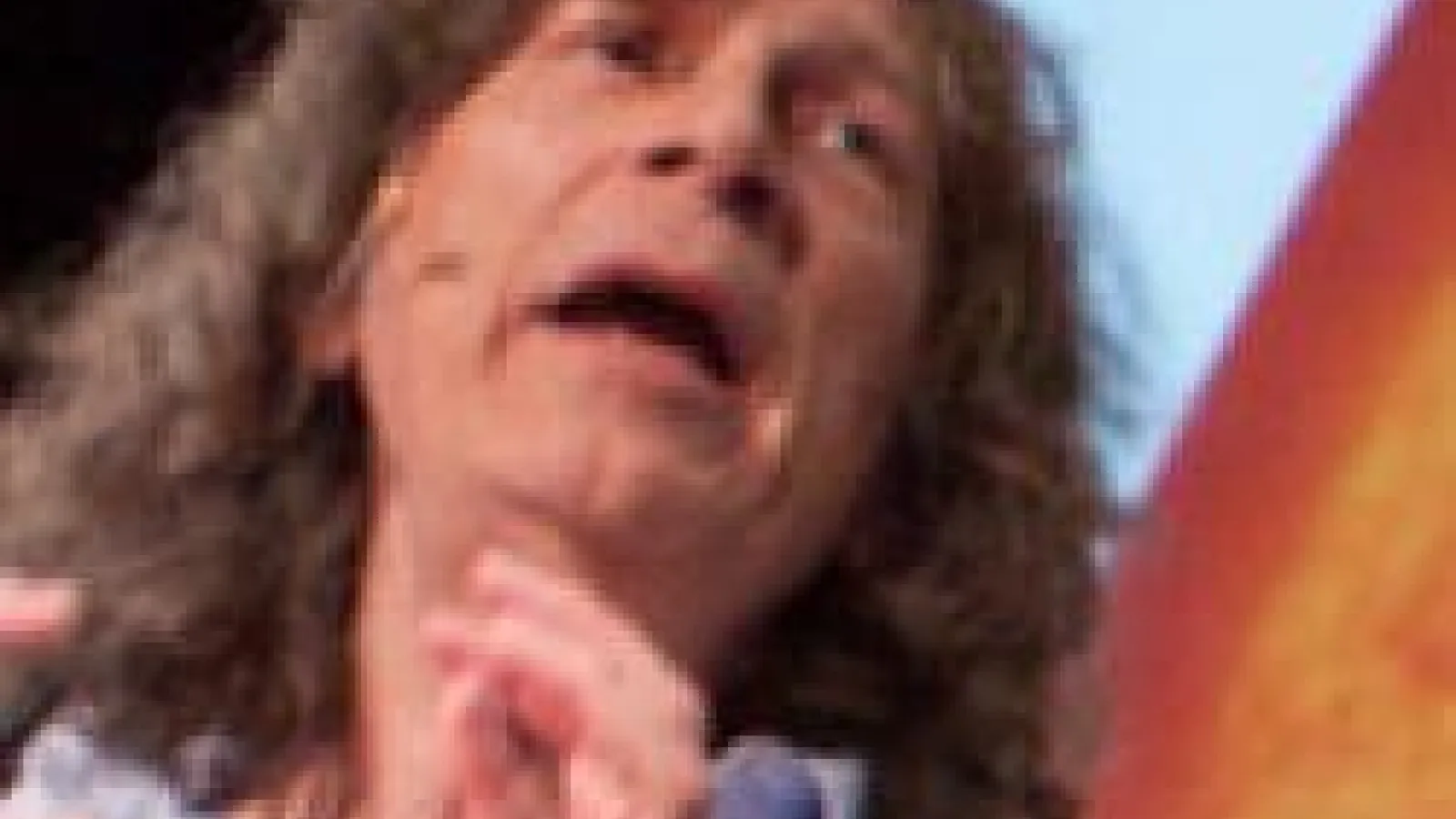 A close-up of Gordon Aubrecht speaking at a lecture.