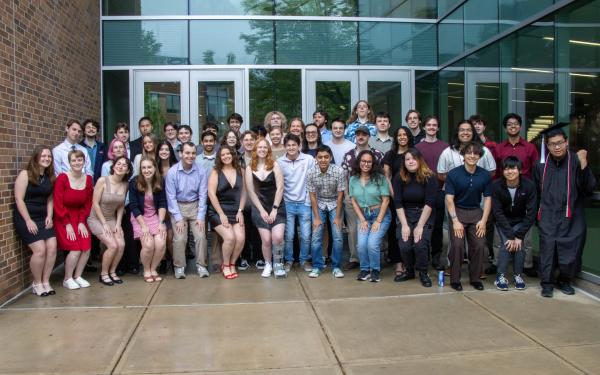 Undergraduate class of 2025 standing outside the PRB enterance