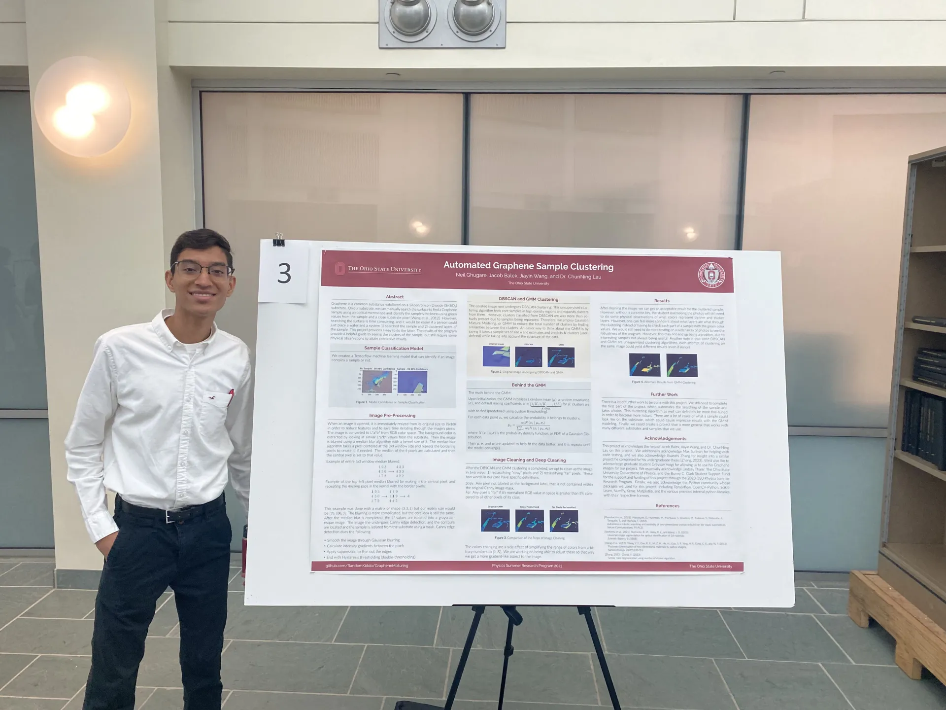 Neil Ghugare with poster of his research