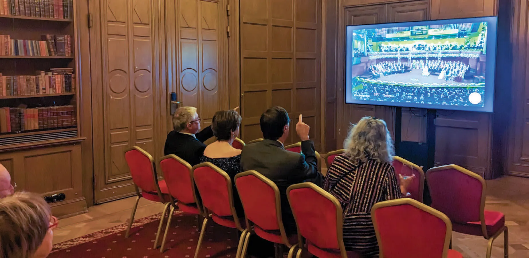 Members of the physics department watching the ceremony online