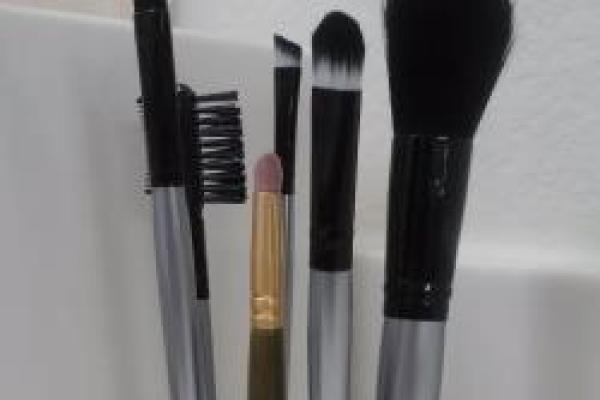 Various sized makeup brushes