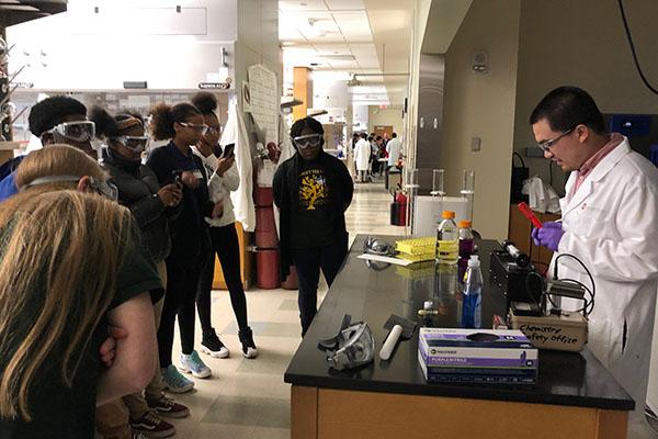 students watching a science demonstration