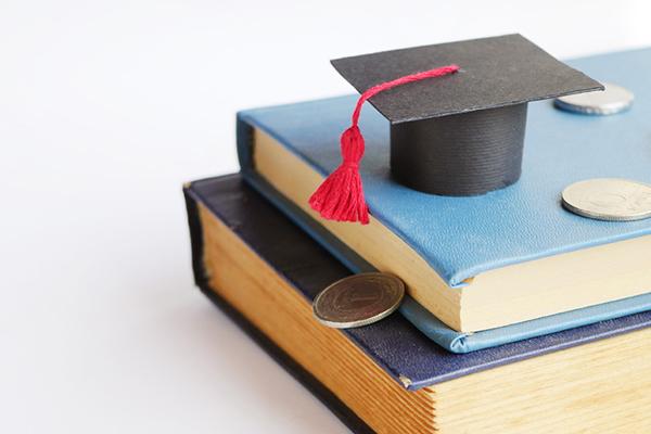 Books and graduation cap