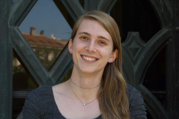 Tessa Cookmeyer smiling in front of a window