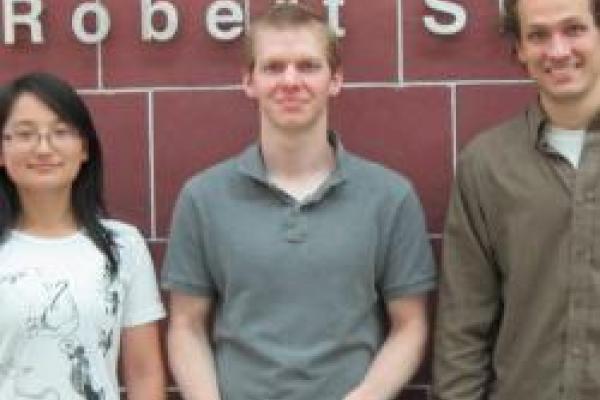 The posters winners are pictued with Shirley Li on the left, Patrick Poole in the middle, and Kyle Kafka on the right.