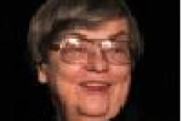Helen Farrell blurry with black background