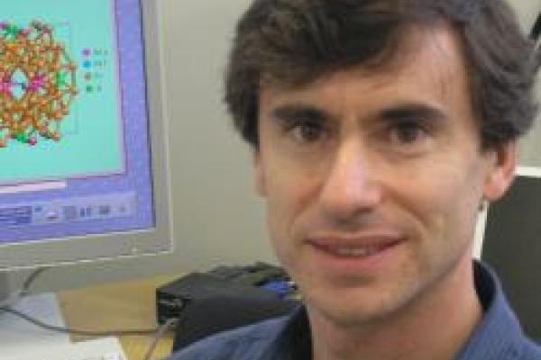 Daniel Haskel with computer in the background