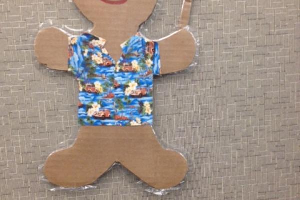 Cardboard gingerbread man in Hawaiin shirt