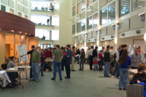 Crowd of grad students milling about the PRB Atrium