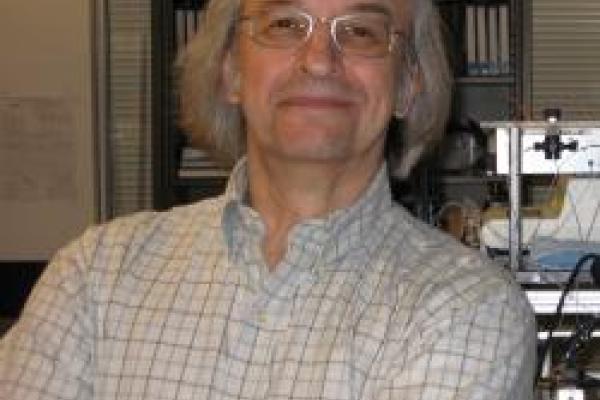 Stephen Kowalczykowski standing in his lab