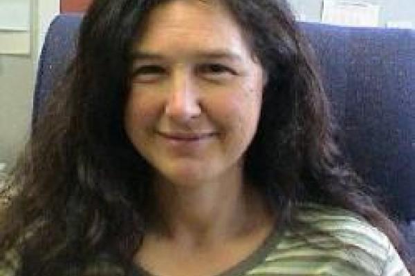 Adriana Moreo sitting in blue chair