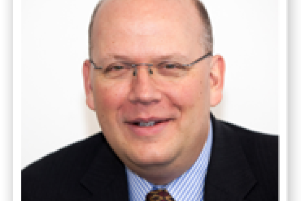 Headshot of  Damian Handzy