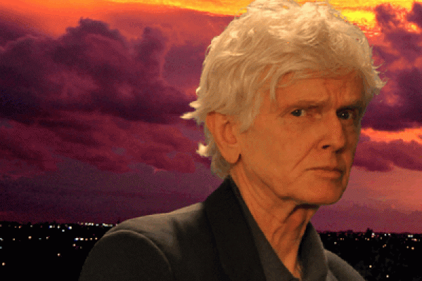 sam moree with dramatic purple and orange sunset and clouds in background