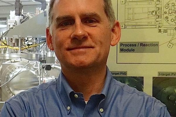 Jeff Childress with lab in the background