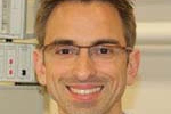 Dr. Stefan Stoll smiling close up