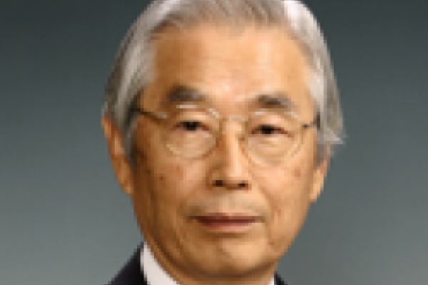 Sumio Iijima headshot with grey background
