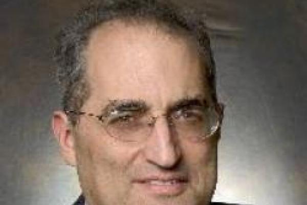 Edward Witten with grey background