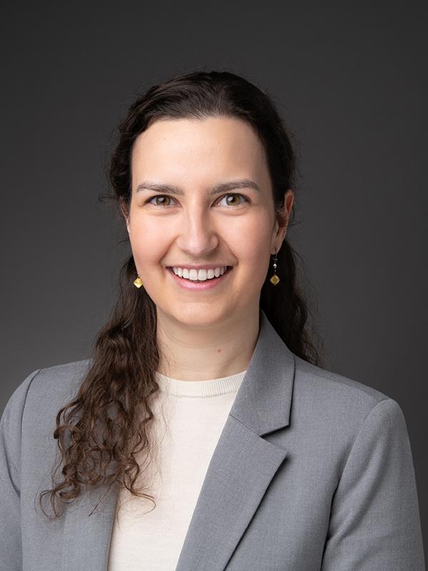 Portrait of Larissa Boie with a dark background.