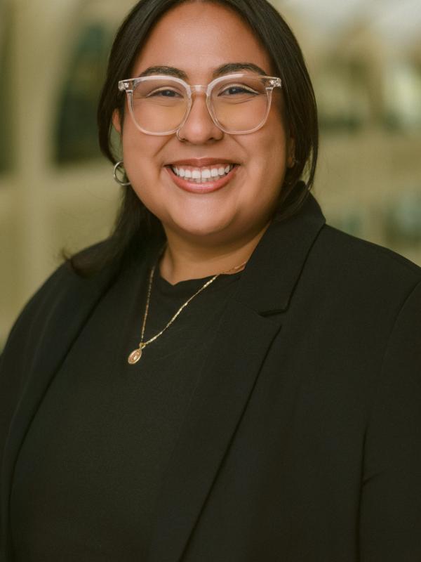 photo of Alex smiling in PRB atrium