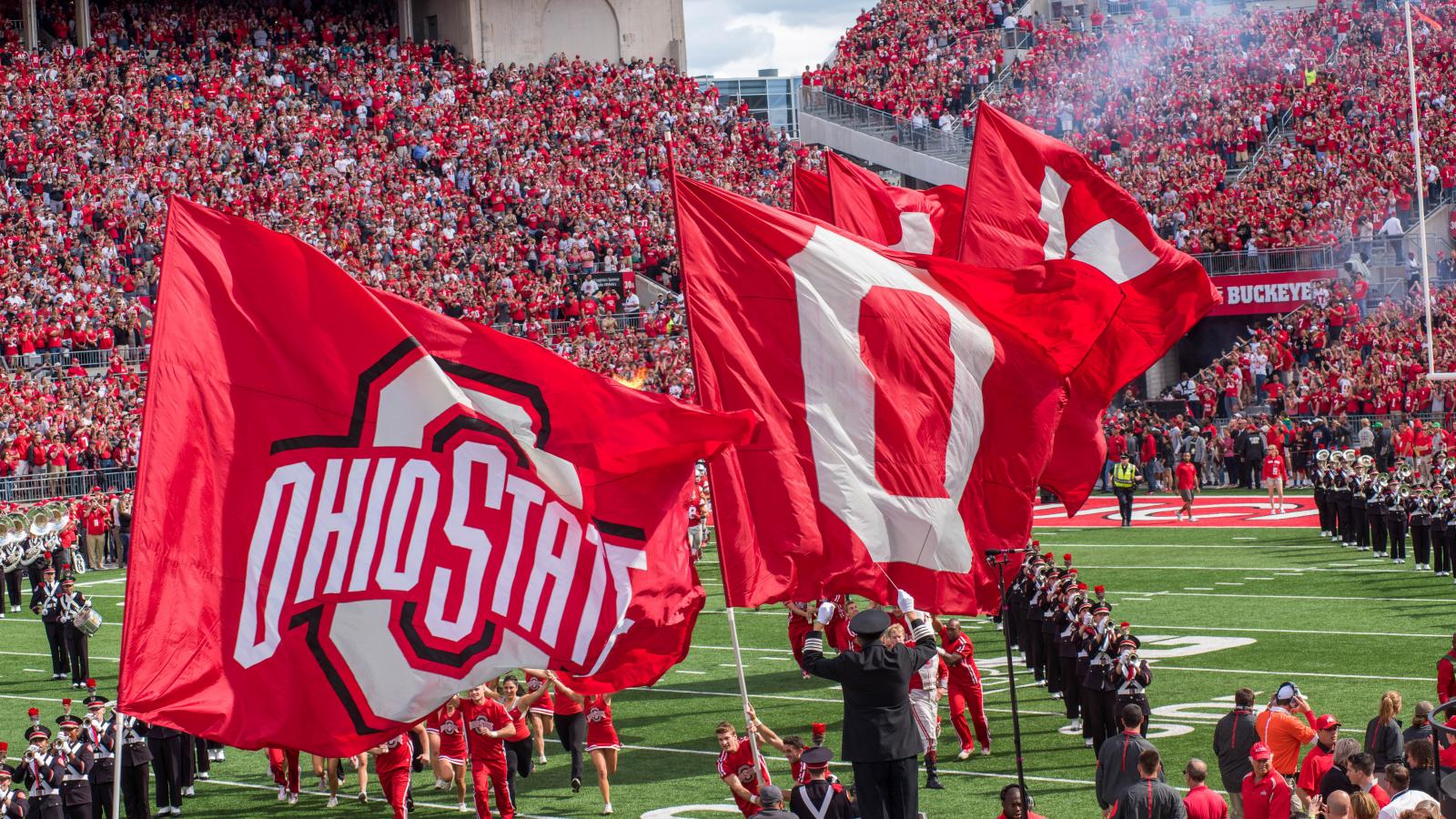 osu flags at football game