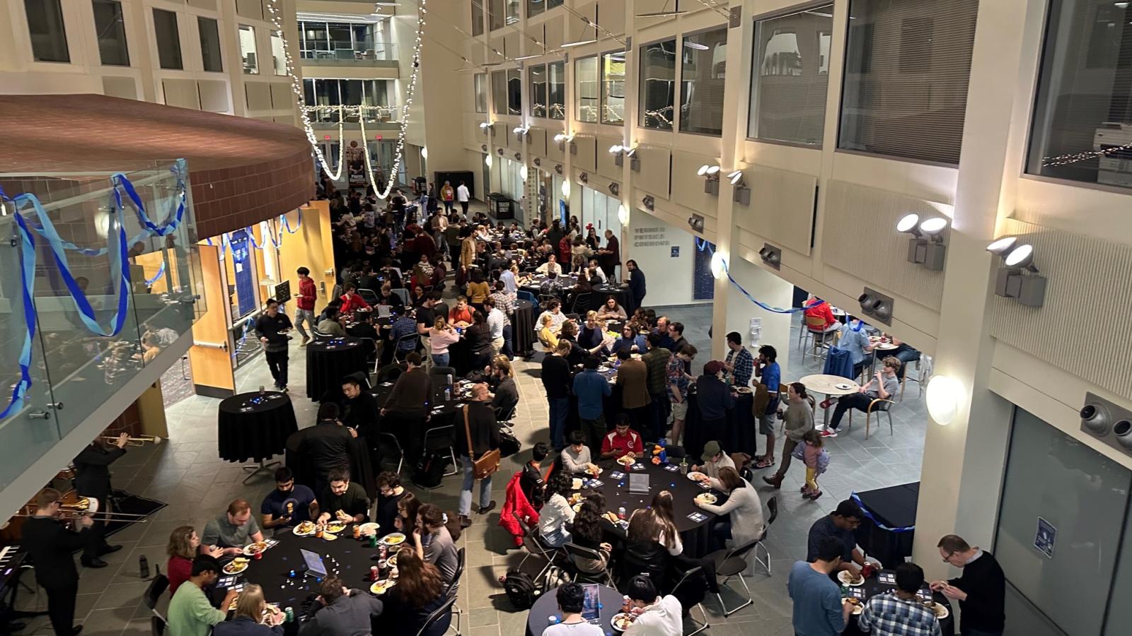 Looking down onto the Winter Party in the PRB Atrium, 2024.