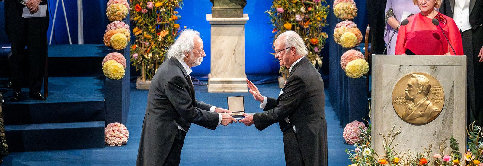 Pierre receiving the Nobel prize